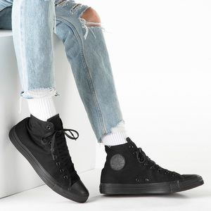 Classic Chuck Taylor black on black high top converse wide.